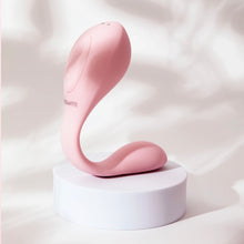 Charger l'image dans la galerie, Vibrateur à succion à double stimulation Coco rose de Puissante sur un socle petit avec une douce lumière