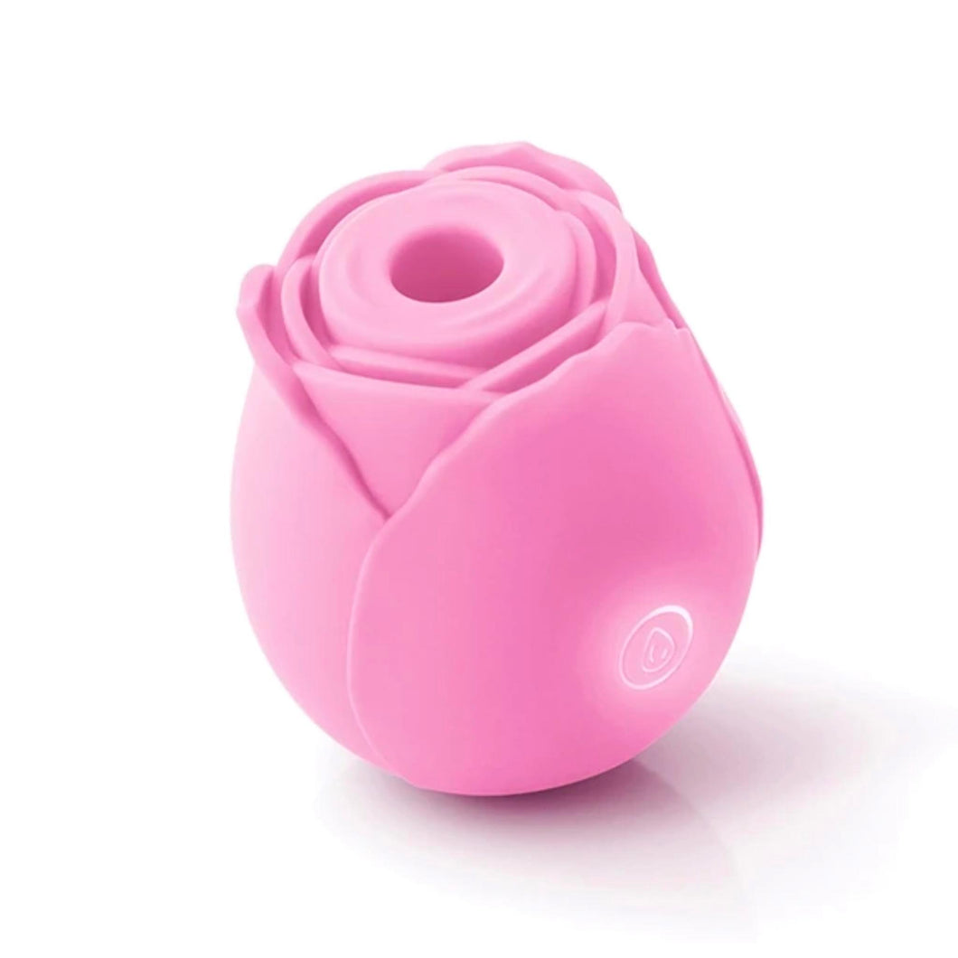 Vibrateur à succion The Rose de couleur rose pâle sur fond blanc